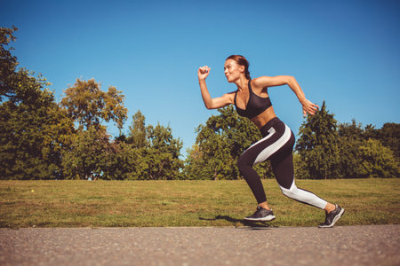beautiful girl running in the park
