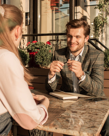 businessman working at the table in open coffee