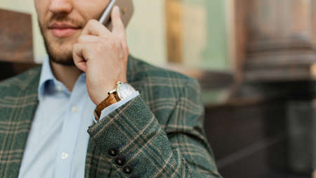 slode-up. business man calls on the phoneの写真素材