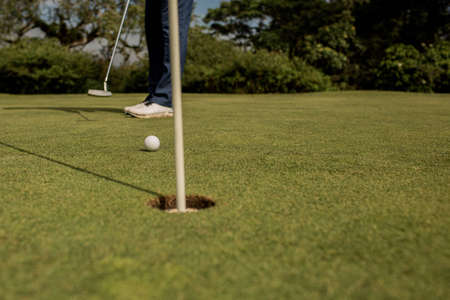 Close-up of a golf holeの写真素材