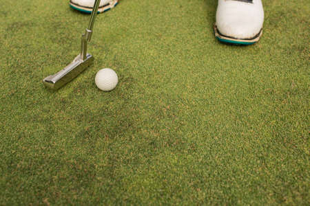 A person playing golf.の写真素材