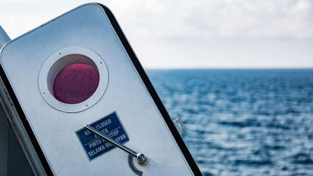 open boat door overlooking the oceanの写真素材