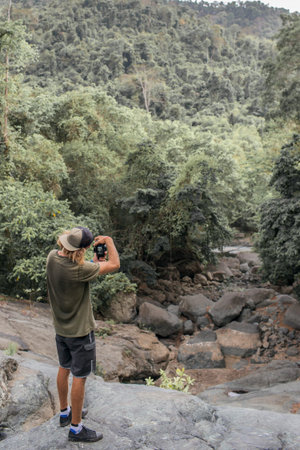 photographer takes pictures of the forest