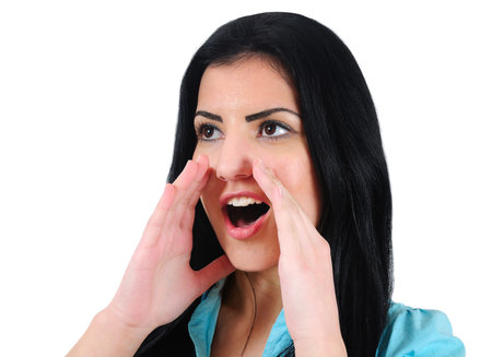 Isolated young business girl screaming