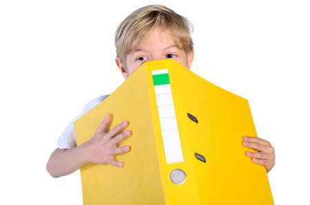 Young boy playing with dossierの写真素材