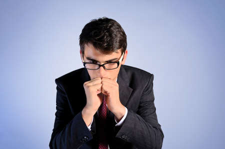 young business man on blue backgroundの写真素材