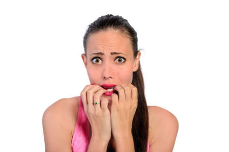 isolated young fitness woman worriedの写真素材