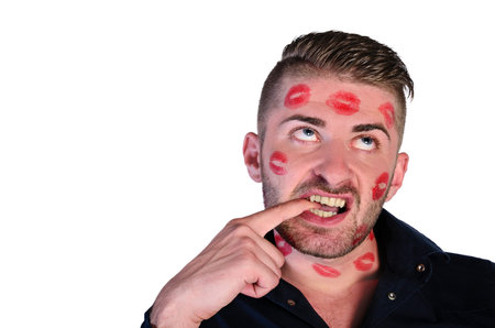 young man confused print red lips on face on white bacground