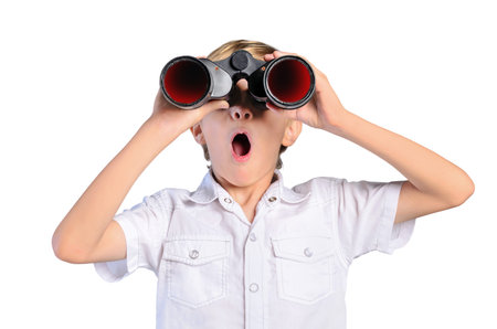 young child boy with binocular on white backgroundの写真素材