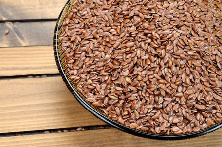 flax seed on wooden tableの写真素材