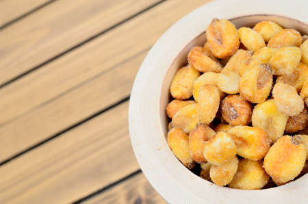 yellow corn on wooden tableの写真素材