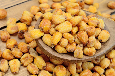 yellow corn on wooden table