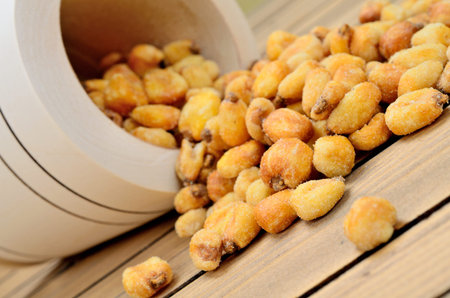 yellow corn on wooden table