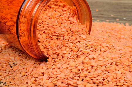 red lentil on wooden tableの写真素材