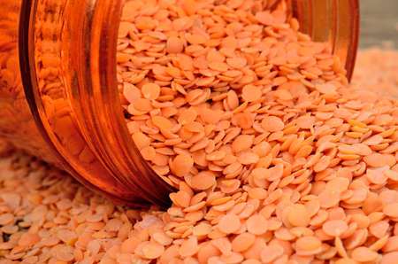 red lentil on table with jarの写真素材