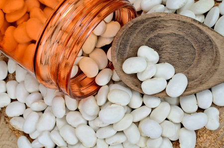 white beans on wooden table