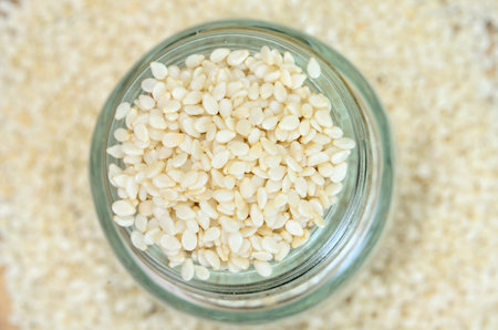 white sesame on wooden table