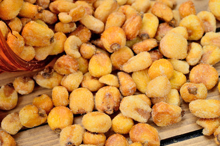 yellow corn on wooden table