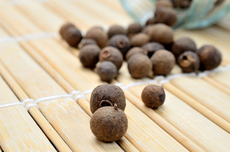allspice on wooden tableの写真素材