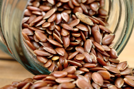 flax seed on wooden tableの写真素材