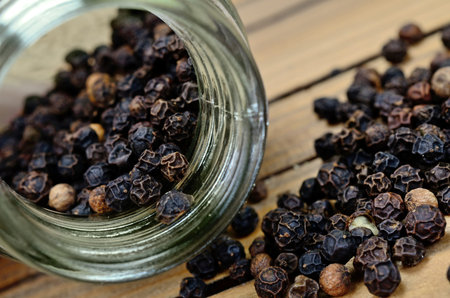 peppercorn on wooden tableの写真素材