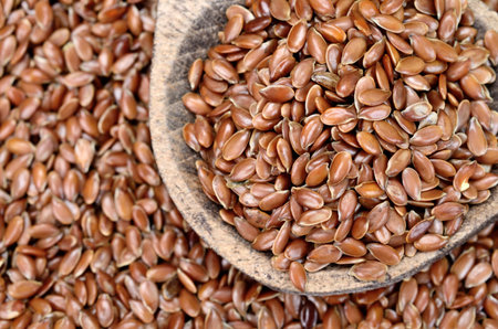 flax seed in wooden spoon