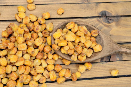 yellow corn on wooden table