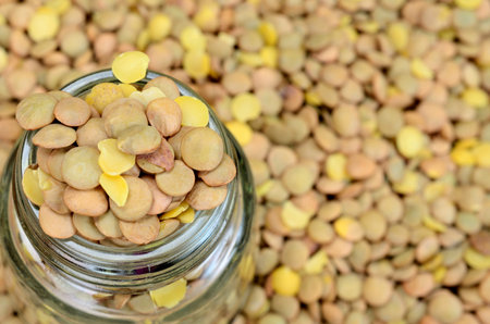 green lentil on wooden table