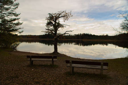 Ostersee lake pond autumn cloudy dark coldの写真素材