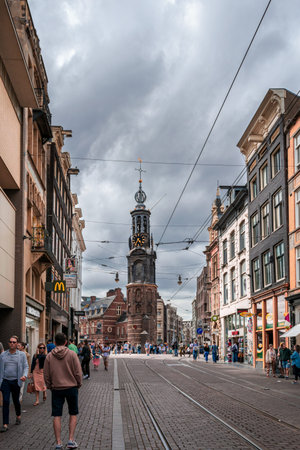 Amsterdam Netherlands - 9 July 2022 : Street life at the center of the city with old architectureのeditorial素材