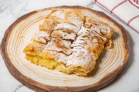 Greek pastry Bougatsa with phyllo dough and semolina custard cream.の写真素材