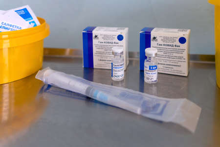 Two ampoules with the  V vaccine against infection  of Russian production are on the medical table. Russian Federation, January 2021のeditorial素材