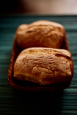 Delicious freshly baked huge ciabatta bread on a table.