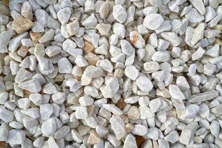 Texture, pattern, background. marble chips for landscaping pebbles close-up samples, marble pebbles, a hard crystalline metamorphic form of limestone,の写真素材