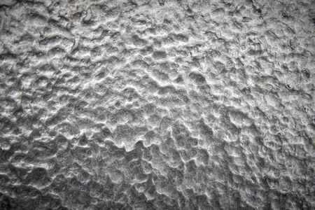 Metal, texture of ice, shiny glowing gray texture of frozen metal.Abstract background and texture for design.の写真素材