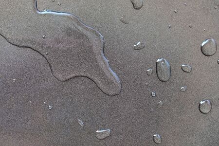 Water drops on the metal surface. Abstract background.の写真素材