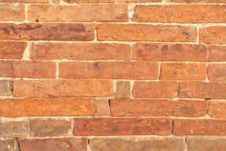 Old brick wall texture with red colorの写真素材