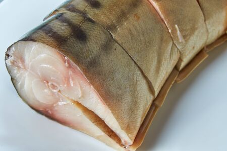 Sliced pieces of cold smoked mackerel, close-upの写真素材