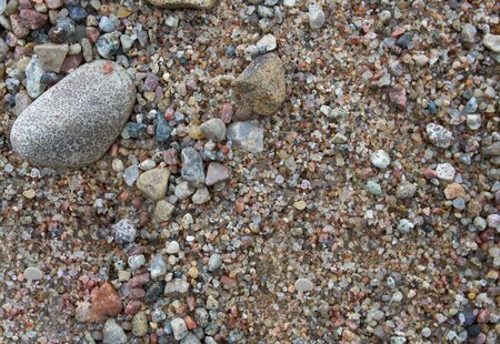 Smooth pebble stones on summer beach. Natural design backgroundの写真素材