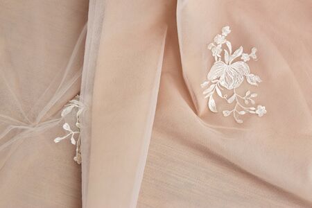 Fabric with Luxurious pattern and large folds, delicate background. Smooth and rich drapes texture.の写真素材