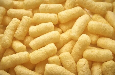 Yellow corn sticks close-up. Background of corn sticks.の写真素材