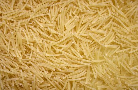 Close up photo of raw durum wheat pasta, filini vermicellesの写真素材
