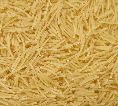 Close up photo of raw durum wheat pasta, filini vermicellesの写真素材