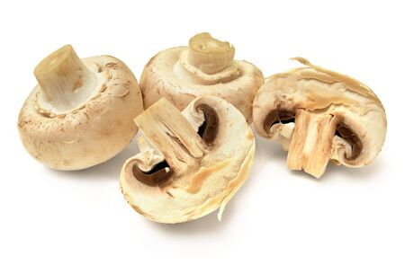 Fresh champignon mushrooms isolated on white.Sliced champignonsの写真素材