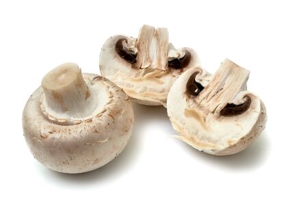 Fresh champignon mushrooms isolated on white.の写真素材