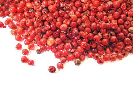 pink peppercorn close up , on white background.の写真素材