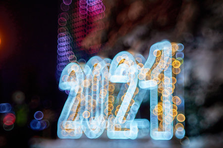 New Year Christmas decoration 2021. Numbers backlit beautiful bokeh in blurの写真素材