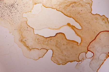 dirty surface of kitchen gas stove with grease and soot stains top view close upの写真素材