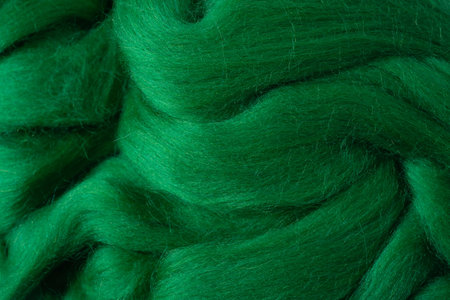Wool texture closeup. Detailed texture with natural green wool