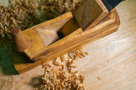 Old planer - tool for processing wood on a white isolated backgroundの写真素材